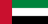 The flag of United Arab Emirates features a red vertical band on its hoist side that takes up about one-fourth the width of the field and three equal horizontal bands of green, white and black adjoining the vertical band.