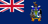 The flag of South Georgia is blue with the UK flag in the canton. The national coat of arms is centered on the fly half and has a green shield with a golden lion holding a torch. A fur seal is to the left of the shield and a Macaroni penguin to the right. A reindeer appears above the crest, and below the shield on a scroll is the Latin motto "LEO TERRAM PROPRIAM PROTEGAT" (Let the Lion Protect its Own Land).