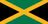 The flag of Jamaica is divided by a gold diagonal cross into four alternating triangular areas of green at the top and bottom, and black on the hoist and fly sides.