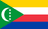 The flag of Comoros is composed of four equal horizontal bands of yellow, white, red and blue, with a green isosceles triangle superimposed on the hoist side of the field. This triangle has its base on the hoist end, spans about two-fifth the width of the field and bears a fly-side facing white crescent and four five-pointed white stars arranged in a vertical line along the opening of the crescent.