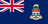 The flag of the Cayman Islands is composed of a blue field with the UK flag in the canton and the national coat of arms centered on the fly half. The coat of arms includes a crest with a pineapple and a turtle above a shield bearing a golden lion. Below are three green stars over white and blue wavy lines. A scroll below the shield bears the motto "HE HATH FOUNDED IT UPON THE SEAS."