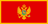 The flag of Montenegro features a large red central rectangular area surrounded by a golden-yellow border. The coat of arms of Montenegro is centered in the red rectangle.
