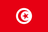 The flag of Tunisia has a red field. A white circle bearing a five-pointed red star within a fly-side facing red crescent is situated at the center of the field.