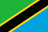 The flag of Tanzania features a yellow-edged black diagonal band that extends from the lower hoist-side corner to the upper fly-side corner of the field. Above and beneath this band are a green and light blue triangle respectively.