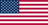 The flag of the United States Minor Outlying Islands is composed of thirteen equal horizontal bands of red alternating with white. A blue rectangle, bearing fifty small five-pointed white stars arranged in nine rows where rows of six stars alternate with rows of five stars, is superimposed in the canton.