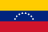 The flag of Venezuela is composed of three equal horizontal bands of yellow, blue and red. At the center of the blue band are eight five-pointed white stars arranged in a horizontal arc.